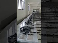 Conjunto de sistema de transmisión por cadena y transportador industrial de servicio pesado