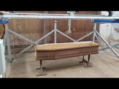 Sistema de acabado para productos funerarios de madera
